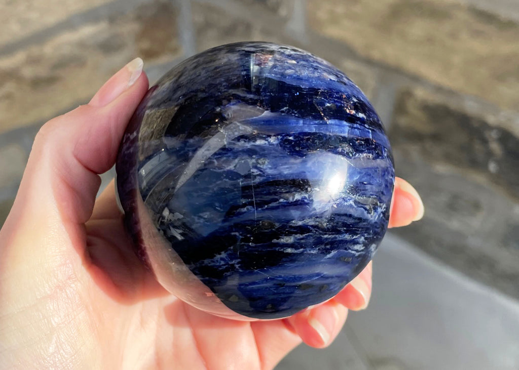 Large Polished Sodalite Sphere With Hematite Inclusions